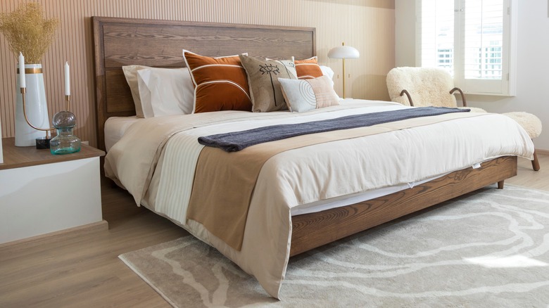 King bed in earthy bedroom