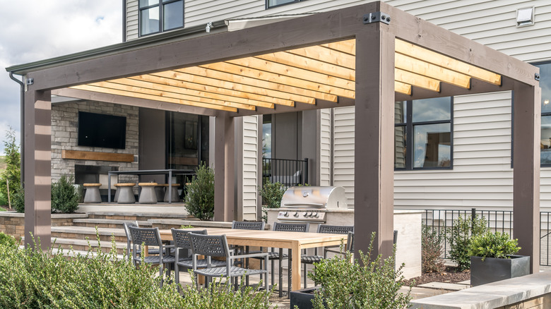 Outdoor kitchen with large table