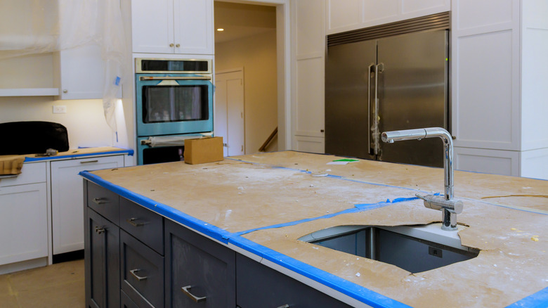 A kitchen that's currently undergoing a remodel.