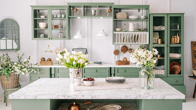green-themed custom cabinets