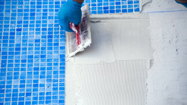 tiling pool with blue tiles