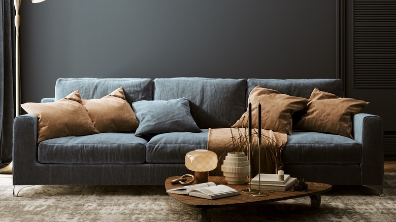 Gray sofa in dark room