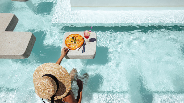 Girl relaxing in cocktail pool