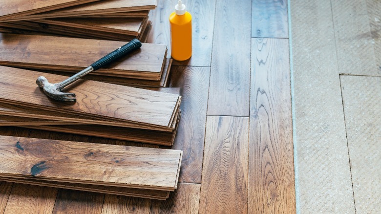 https://www.housedigest.com/img/gallery/how-much-does-it-cost-to-put-in-wood-flooring/factors-for-cost-1646756472.jpg