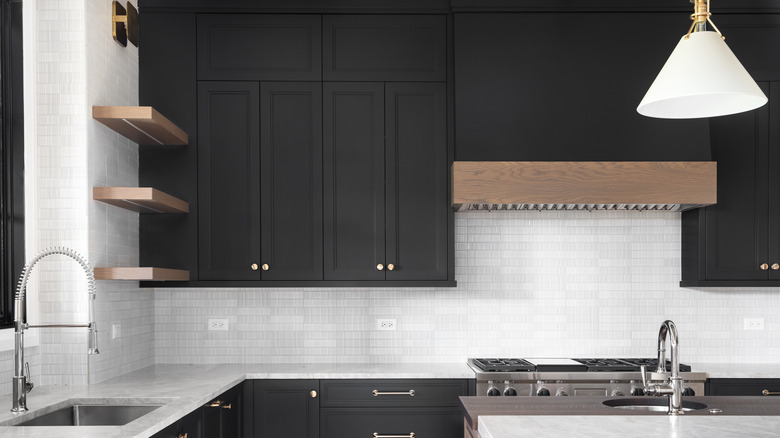 Black cabinets with metal handles