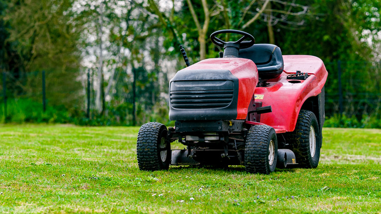 Close-up of red riding mower