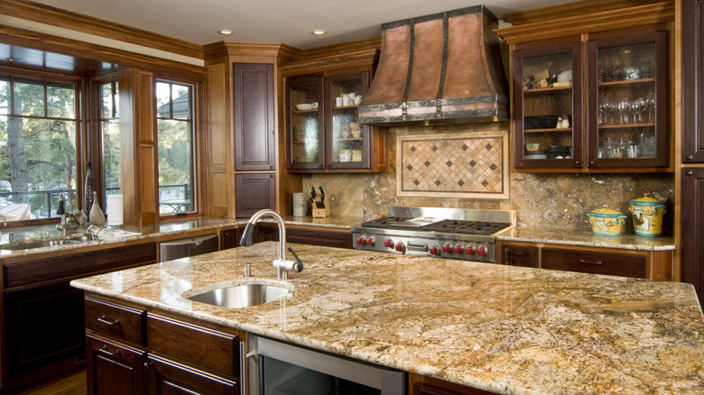 rustic cabin kitchen with brown granite