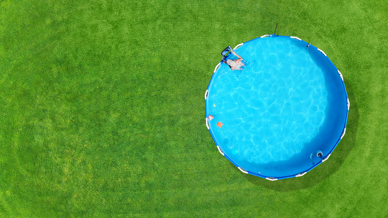 Looking down at lawn, pool