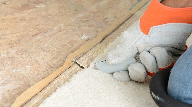 Cutting through carpet to subfloor 