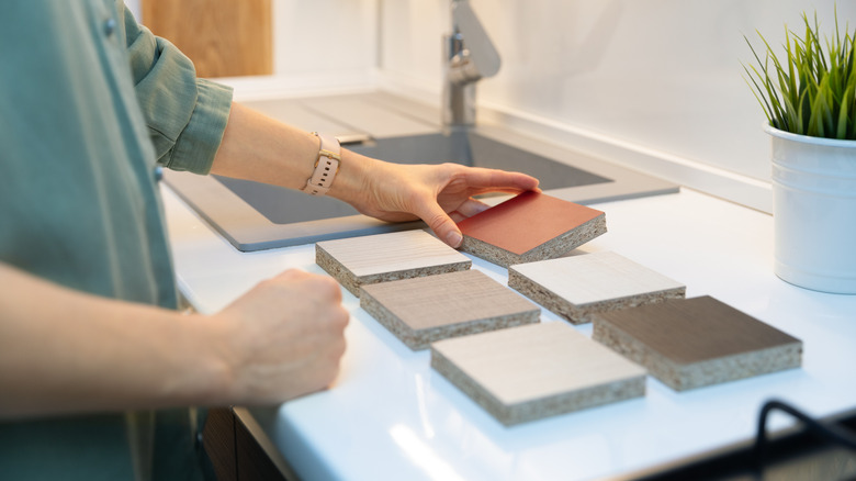 Woman picking out countertops