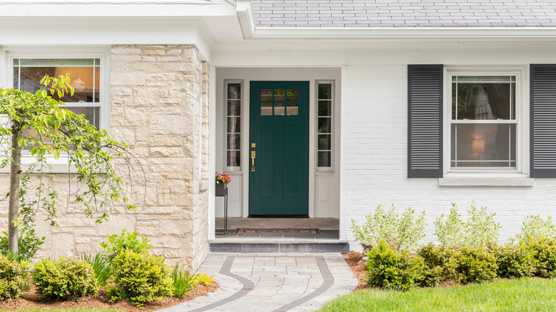Home with a white brick exterior