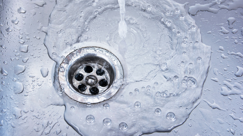 water running down a sink drain