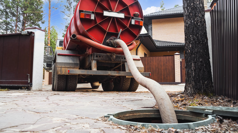 truck pumping a septic tank