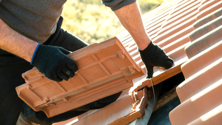 installing new roof tiles