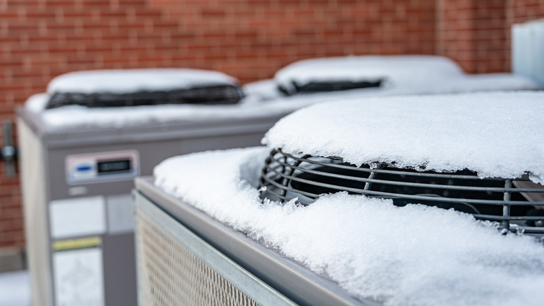 snow-covered HVAC unit