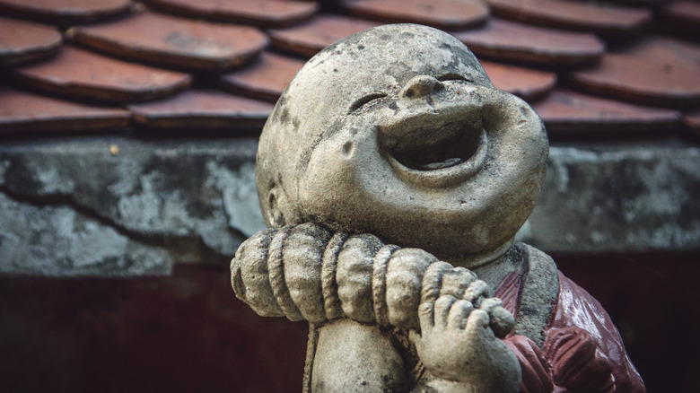 Laughing buddha statue