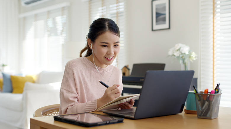 Woman working on laptop