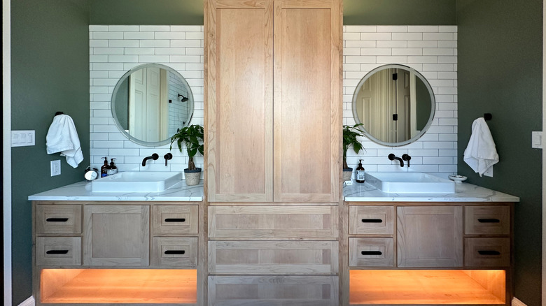 modern bathroom with double sinks and tall backsplash