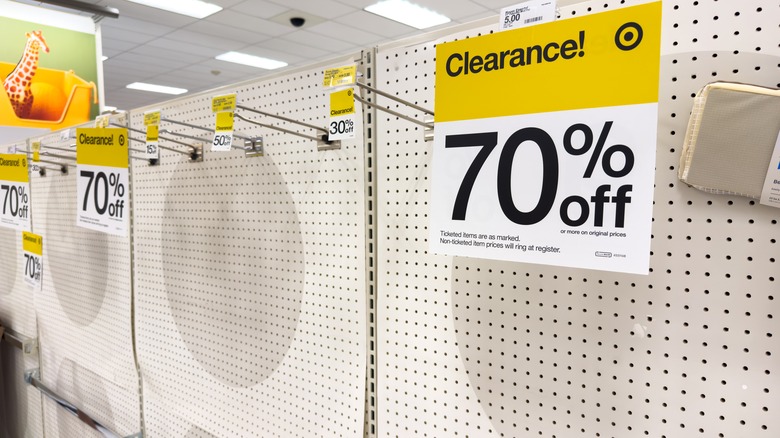 Empty clearance section at a target with 70% off signs