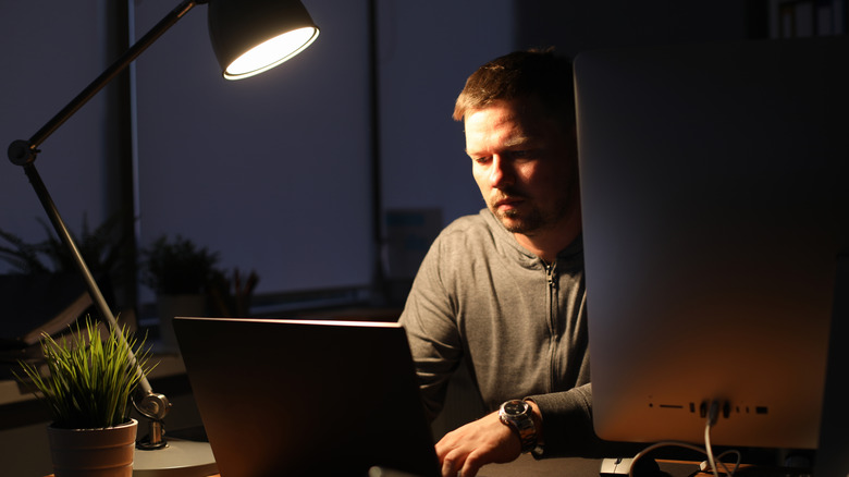 person working lamp
