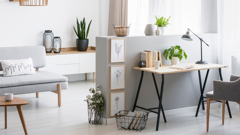 Shelving in front of desk