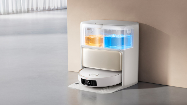 MOVA V50 Ultra robotic vacuum cleaner in docking station with water reservoirs shown