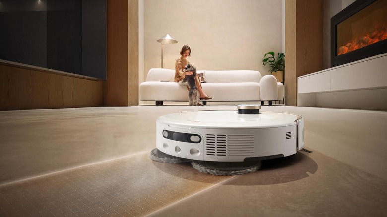 MOVA V50 Ultra robotic vacuum cleaner mopping hard floors in living room
