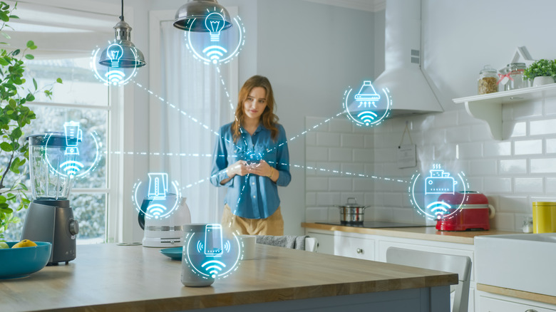 Woman surrounded by appliances