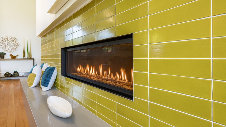 fireplace with lime colored tile