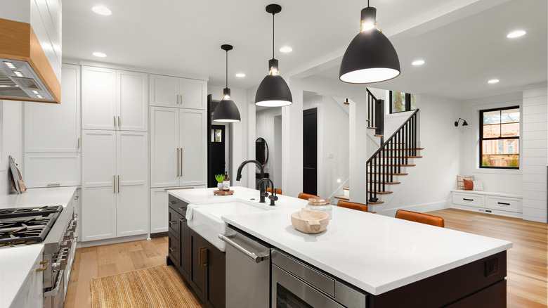 black pendant lights over island 