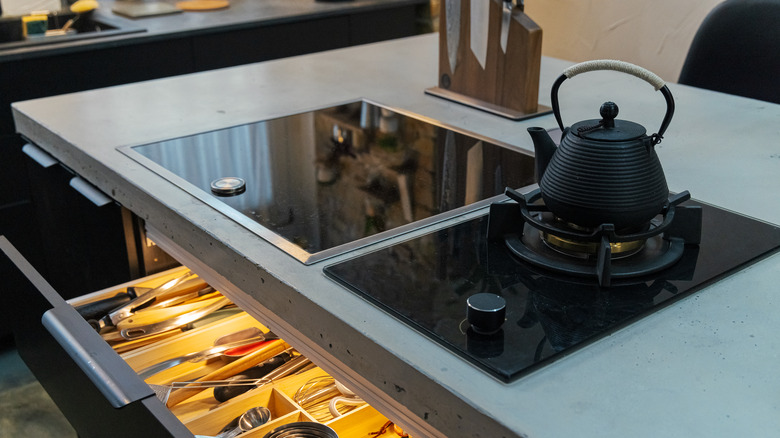 concrete countertop with modern stovetops
