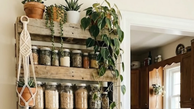 A useful kitchen storage shelf made from scrap wood pallets