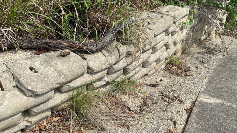Retaining wall, built with bags of concrete.