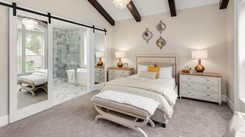 Mirrored barn doors in bedroom