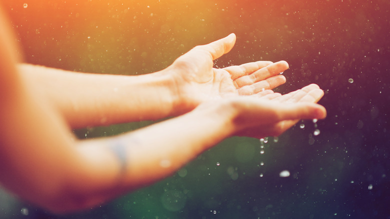 hands in an outdoor shower