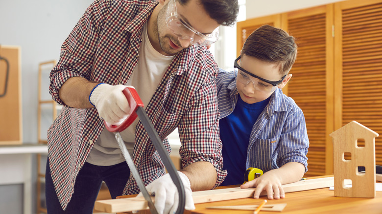 dad and son building