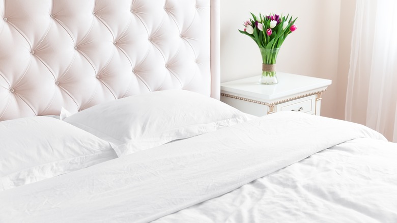 bed with white bed pillows