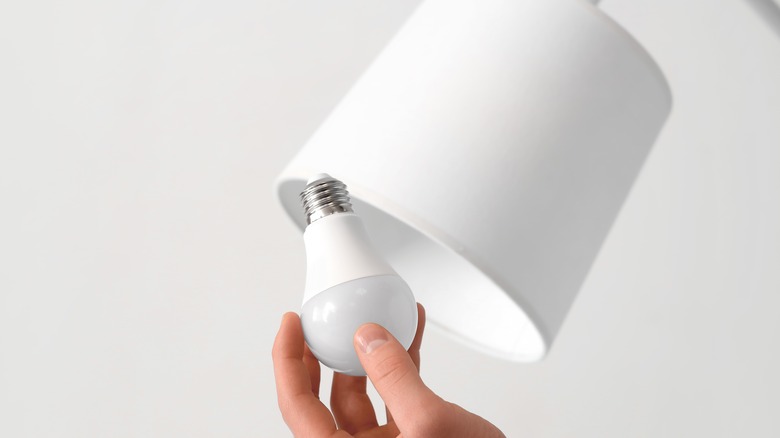 Removing light bulb from lamp