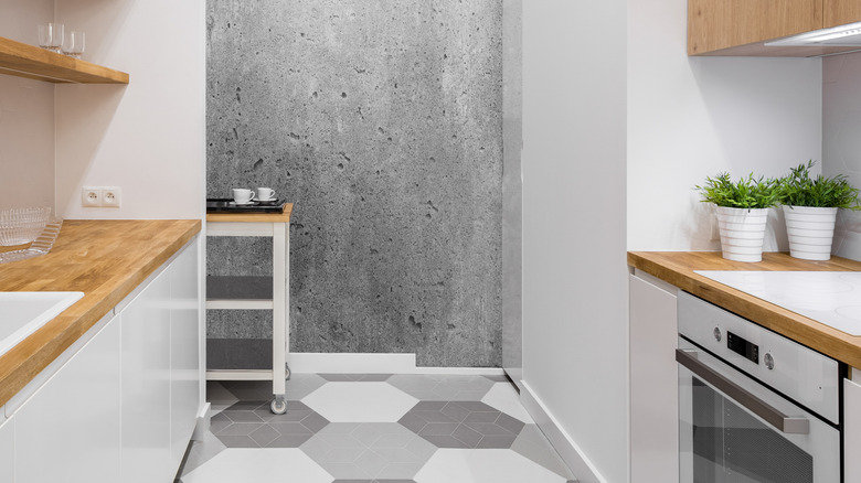kitchen with gray and white hexagonal tiles