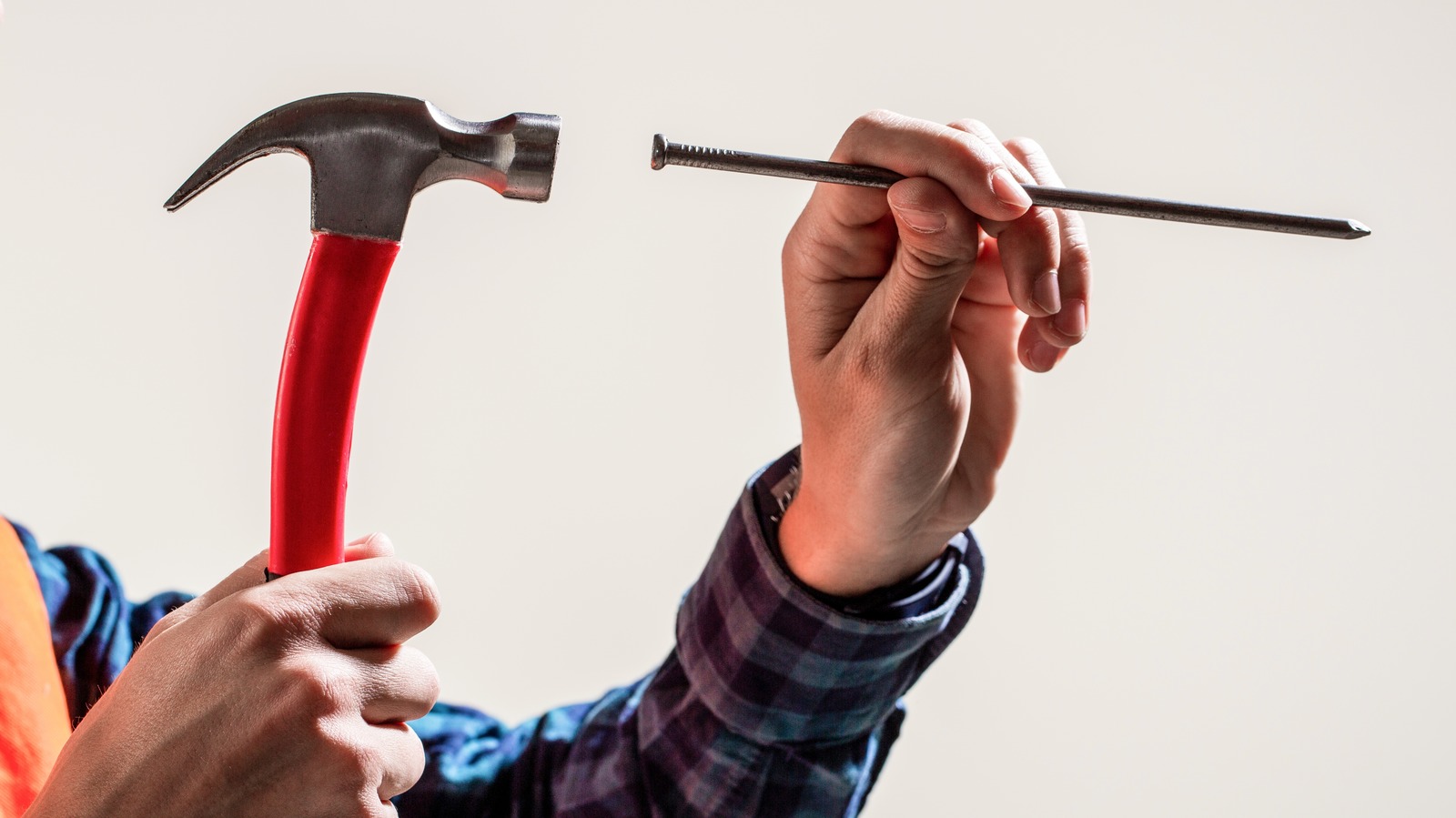 The Secret To Hammering Without Hitting Your Fingers Is In Your Bathroom