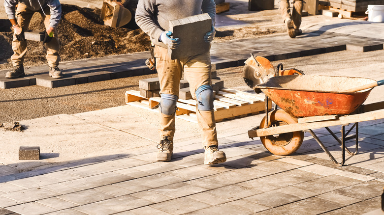 workers building driveway