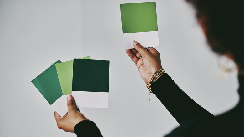Samples of green paint in different hues.
