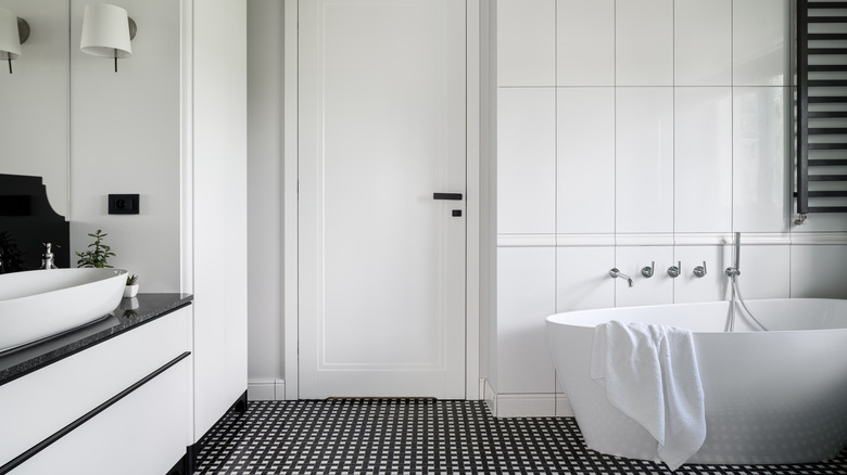 white bathroom with white tiles