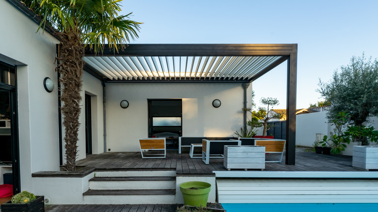 Wooden pergola on patio