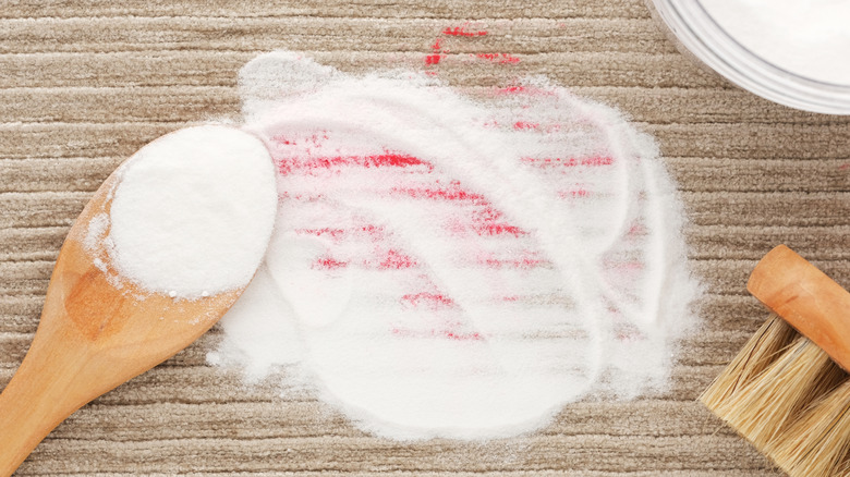 Baking soda on top of a rug stain