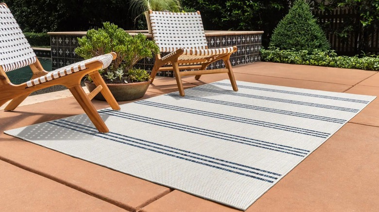 striped outdoor rug with chairs