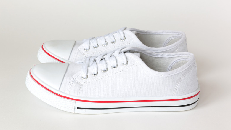 White canvas sneakers with white background