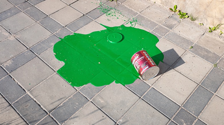 green paint spill on floor