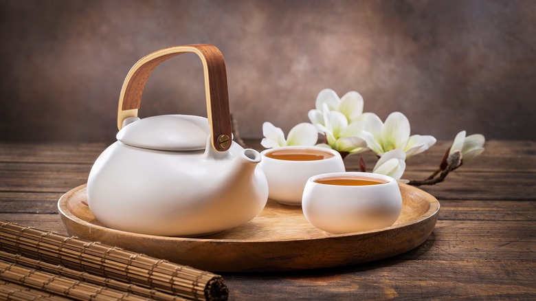 tea set on wooden tray