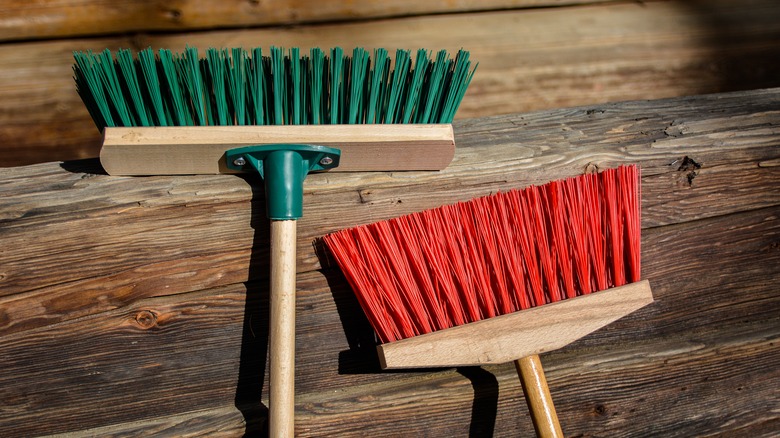 Red and green brooms